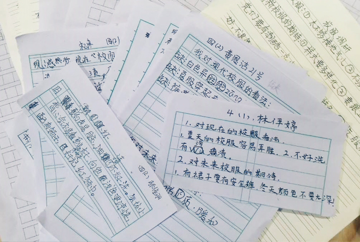 厦门英才学校师生与家长的手写留言信件特写，字里行间表达对学校品牌升级的祝福与期待
