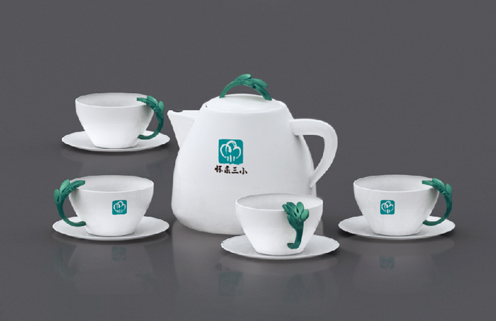 怀柔三小绿色枝叶纹样陶瓷茶具器物设计,体现校园文化品牌雅致气质